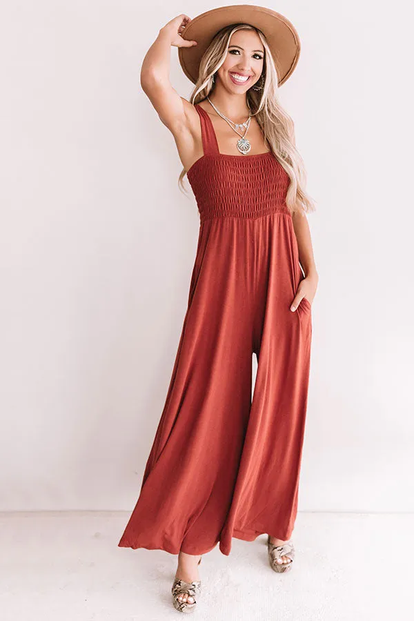 Light And Breezy Smocked Jumpsuit In Rust